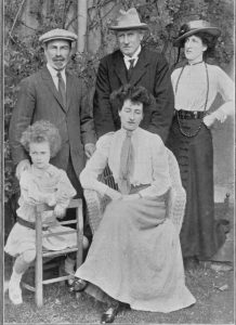 Mrs Graham Smith (seated on the right) with Lord Asquith (standing behind her) and Lady Margot Asquith (standing on the far right)